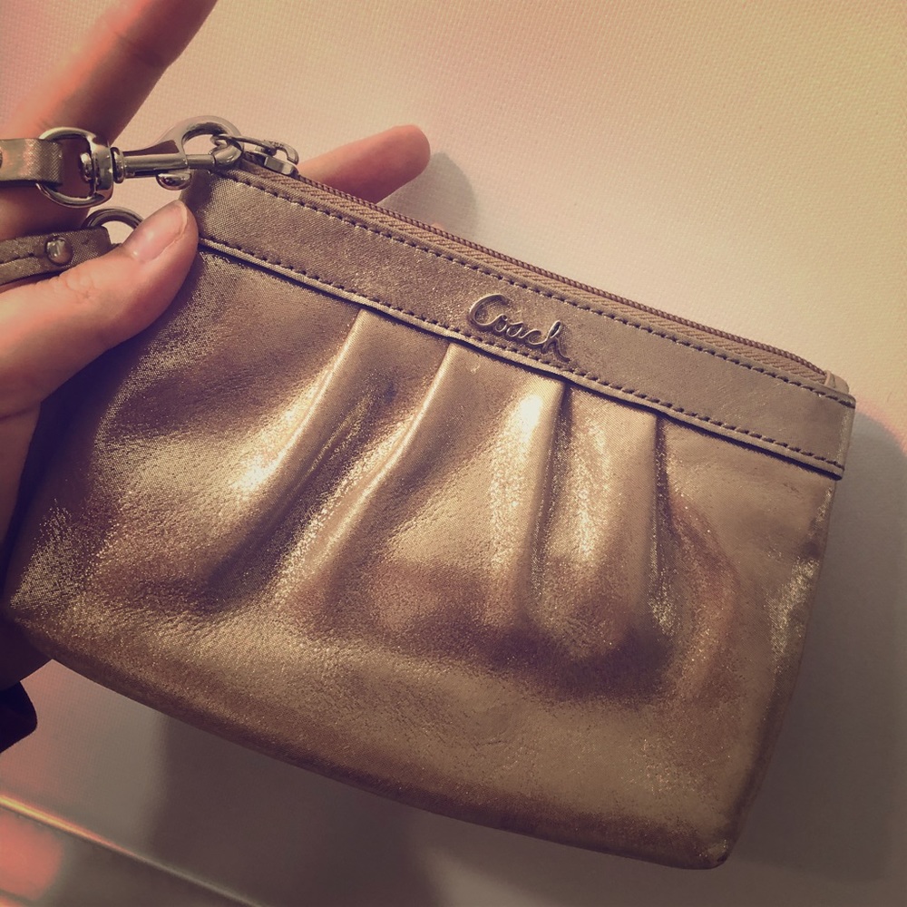 Coach gold wristlet